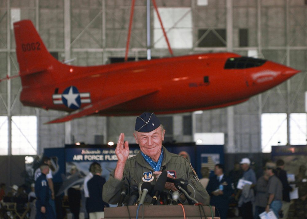 In this Tuesday, October 14, 1997, file photo, Chuck Yeager explains it was simply his duty to fly the plane, during a news conference at Edwards Air Force Base, California, after flying in an F-15 jet fighter plane, breaking the sound barrier once again during the 50th anniversary of supersonic flight. In this Tuesday, October 14, 1997, file photo, Chuck Yeager explains it was simply his duty to fly the plane, during a news conference at Edwards Air Force Base, California, after flying in an F-15 jet fighter plane, breaking the sound barrier once again during the 50th anniversary of supersonic flight.
