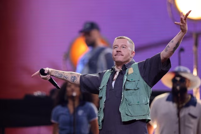 Rapper Macklemore performs during the opening ceremony of the Invictus Games, in Duesseldorf, Germany, September 9, 2023. REUTERS/Thilo Schmuelgen/ File Photo