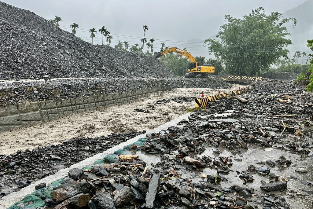 Debris were swept away due to flooding by torrential rains in Kaohsiung. (AFP)