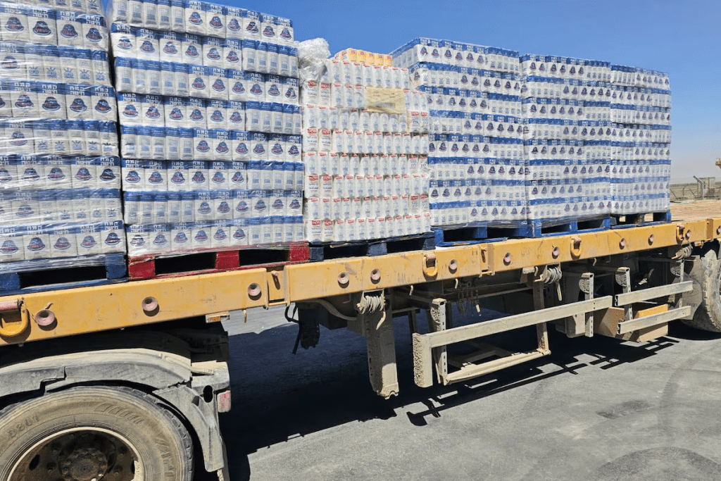 A truck loaded with aid is seen at the Kerem Shalom crossing between Israel and Gaza, on its Israeli side in this handout image obtained by Reuters on May 20, 2025. COGAT/Handout via REUTERS/File Photo