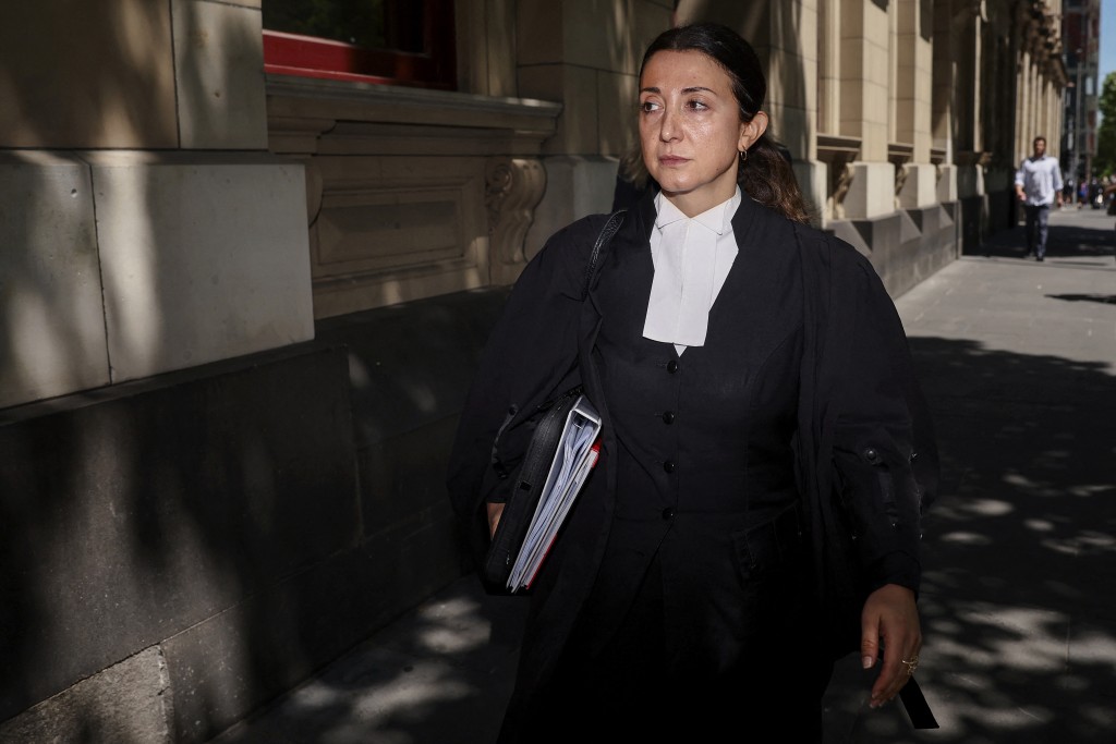 Photo by MARTIN KEEP / AFP  Veronika Drago, barrister for Erin Patterson, leaves the Supreme Court of Victoria after the judgement in Erin Patterson's appeal in Melbourne on October 30, 2026.