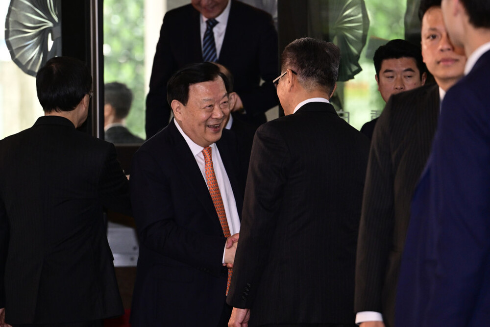 Xia was received by Chief Executive John Lee Ka-chiu and Financial Secretary Paul Chan Mo-po when his motorcade arrived at the government headquarters in Tamar on Monday morning.