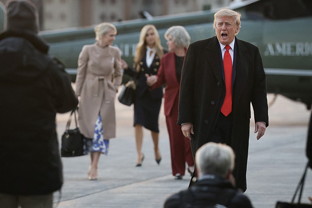 U.S. President Donald Trump prepares to board Air Force One after speaking at a campaign rally in Wasilla on October 13, 2026 at Elmdorf Air Force Base, Alaska. President Trump travelled to Alaska to headline a rally for incumbent Sen. Dan Sullivan (R-AK), who will be facing off against Alaska Democratic Senate candidate, former Rep. Mary Peltola in the midterm elections. Alex Wong/Getty Images/AFP