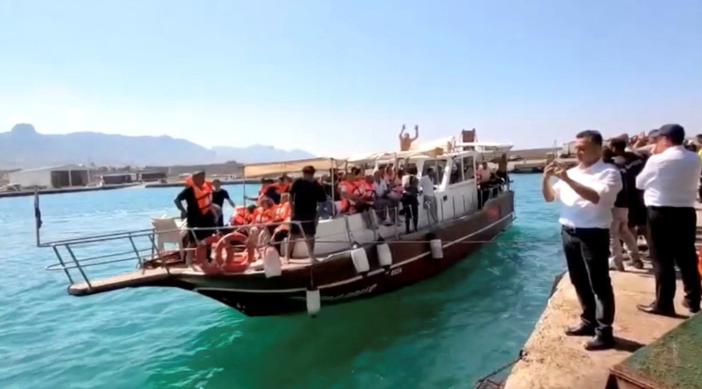 Survivors are taken to shore after boat capsizes, in Kyrenia, northern Cyprus, August 30, 2026 (Reuters)