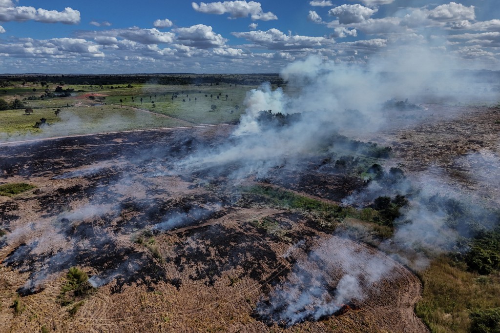Photo by IVAN PISARENKO / AFP Aerial view of a field fire, in Sao Felix do Xingu, Para state, Brazil, on June 16, 2025.