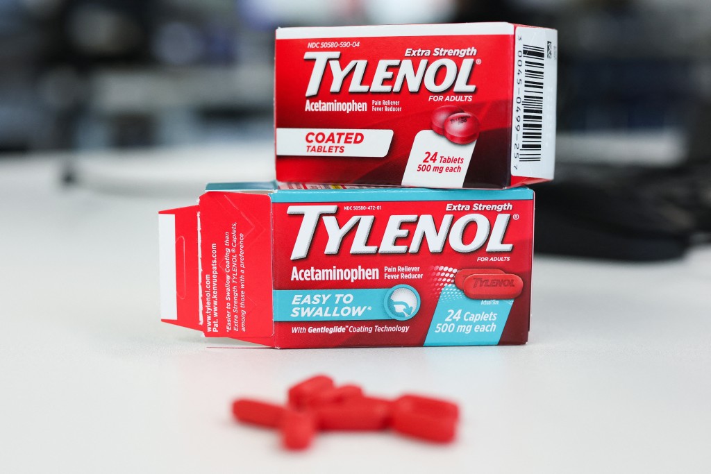 In this photo illustration, Tylenol packages and caplets are displayed, in Los Angeles, California, on September 22, 2025. (Photo by VALERIE MACON / AFP)