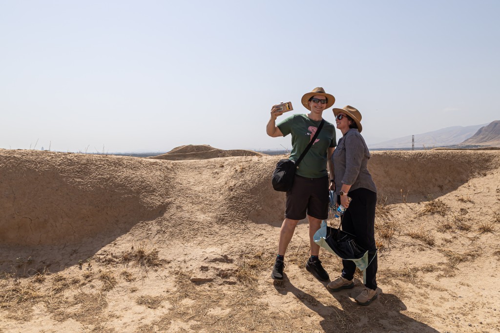 Tourists visit the archaeological ruins of Nisa, an ancient fortress near the capital Ashgabat, on June 14, 2026. (Photo by STRINGER / AFP)