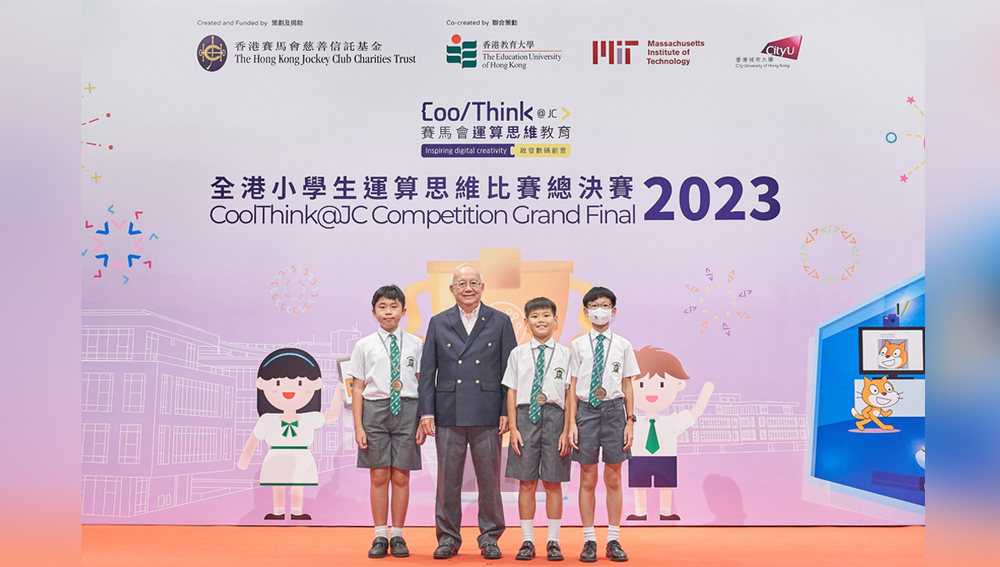 Mr Daniel Lai and St. Joseph's Primary School's SJPS team 2, winners of the Merit of Scratch category.