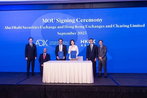 Hong Kong Financial Secretary Paul Chan Mo-po, second right,, UAE Ministry of Investment Undersecretary H.E. Mohammed Alhawi, second left, HKEX Chairman Carlson Tong, right, and Investopia chief executive Jean Fares, back row left. HKEX Chief Executive Officer Bonnie Chan Yi-ting, center, and ADX Group chief executive Abdulla Salem Alnuaimi front row, left. HKEX