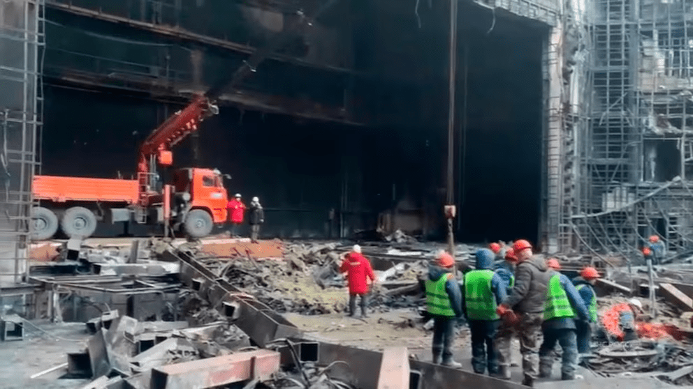 In this photo taken from video released by Russian Emergency Ministry Press Service on Tuesday, March 26, 2024, rescuers work in the burned concert hall after a terrorists attack on the building of the Crocus City Hall on the western edge of Moscow, Russia. Russia is still reeling from the attack Friday in which gunmen killed 139 people in the Crocus City Hall, a concert venue on the outskirts of Moscow. Health officials said about 90 people remain hospitalized, with 22 of them, including two children, in grave condition. (Russian Emergency Ministry Press Service via AP) In this photo taken from video released by Russian Emergency Ministry Press Service on Tuesday, March 26, 2024, rescuers work in the burned concert hall after a terrorists attack on the building of the Crocus City Hall on the western edge of Moscow, Russia. Russia is still reeling from the attack Friday in which gunmen killed 139 people in the Crocus City Hall, a concert venue on the outskirts of Moscow. Health officials said about 90 people remain hospitalized, with 22 of them, including two children, in grave condition. (Russian Emergency Ministry Press Service via AP)