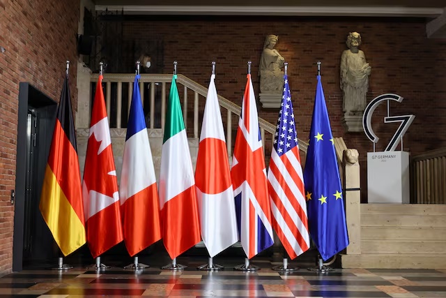 Flags are pictured during the first working session of G-7 foreign ministers in Muenster, Germany, November 3, 2022. REUTERS/Wolfgang Rattay/Pool/File Photo