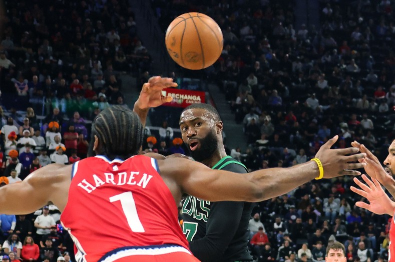 Jaylen Brown throws a pass over James Harden of the Clippers. AFP  