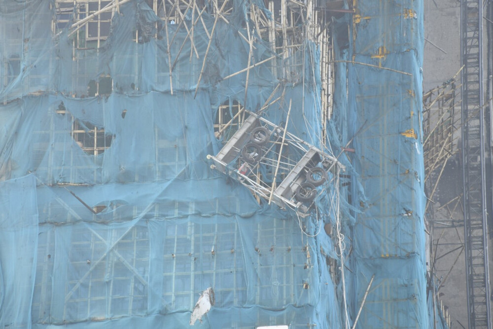 Firefighters would be checking the building to see if its outer walls and remaining scaffolding are structurally sound.