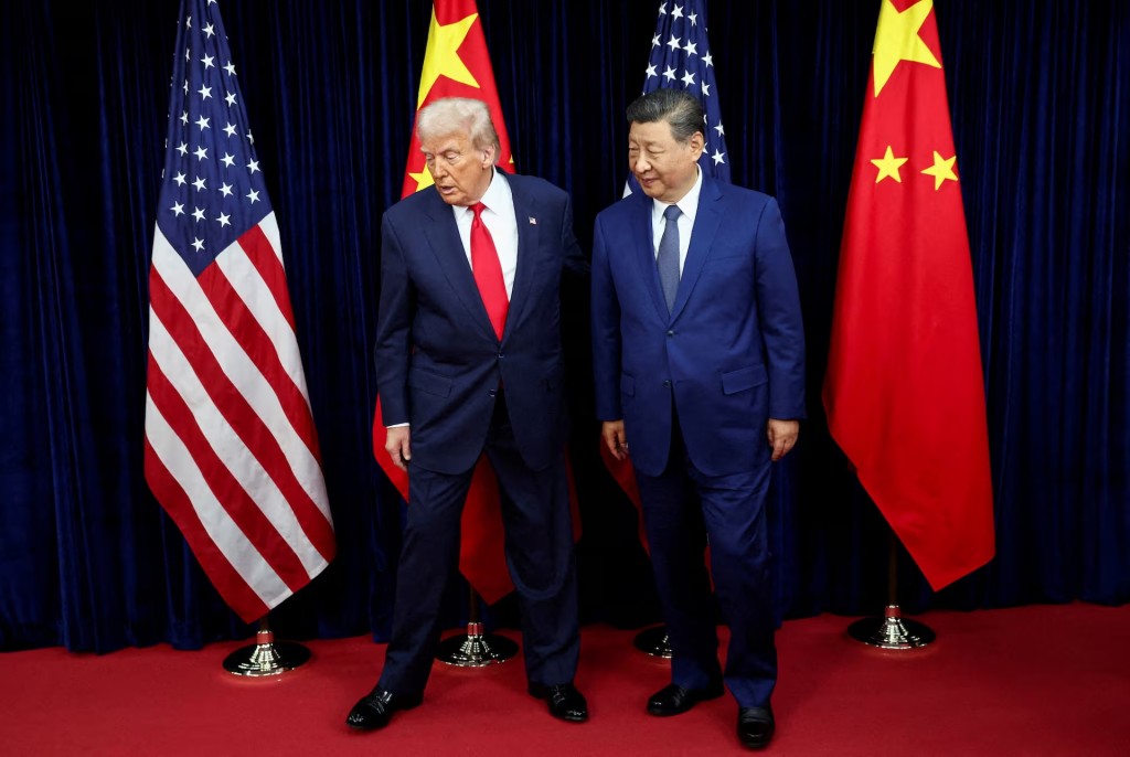 U.S. President Donald Trump and Chinese President Xi Jinping walk, as they hold a bilateral meeting at Gimhae International Airport on the sidelines of the Asia-Pacific Economic Cooperation (APEC) summit in Busan, South Korea, on October 30, 2025. REUTERS/Evelyn Hockstein/File Photo