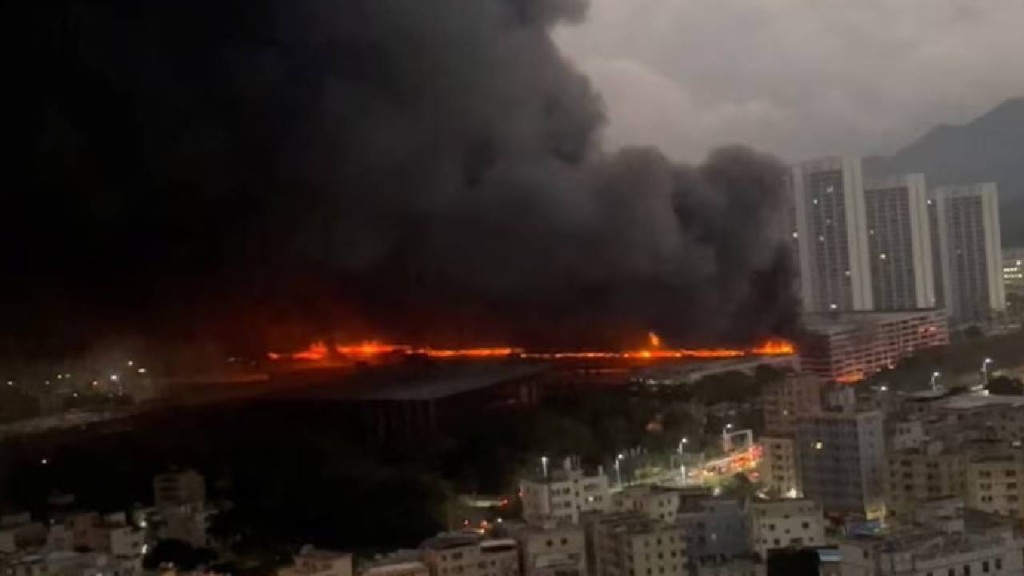 Smoke belows from a fire at a parking garage of BYD at its Shenzhen industrial park, in Shenzhen, Guangdong province, China April 14, 2026, in this screengrab obtained from social media video. Social media/via REUTERS