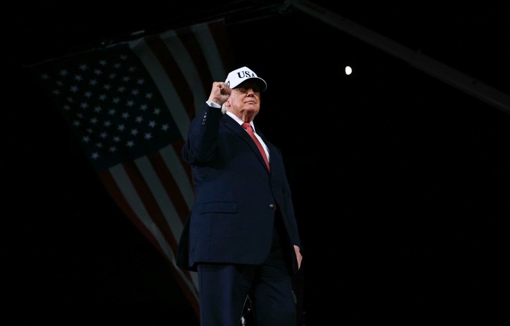 US President Donald Trump arrives to speak at a midterm campaign rally at Pitt-Greenville Airport in Greenville, North Carolina, on October 20, 2026. (Photo by Kent NISHIMURA / AFP)