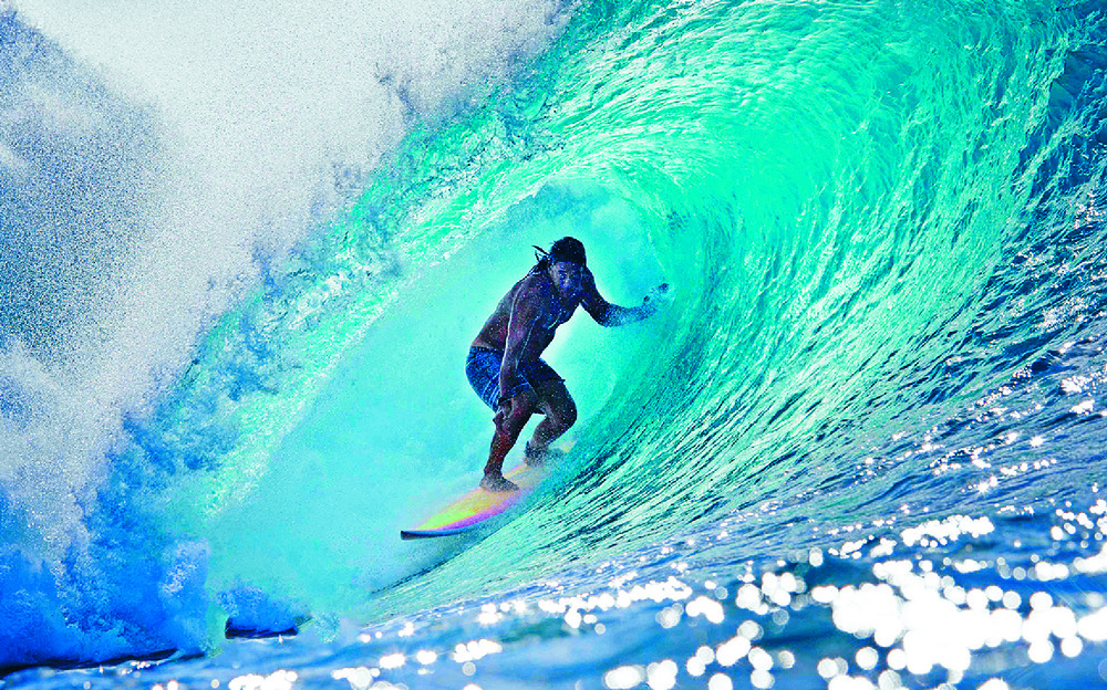 Tamayo Perry surfs on Oahu's North Shore, Hawaii. AFP Tamayo Perry surfs on Oahu's North Shore, Hawaii. AFP