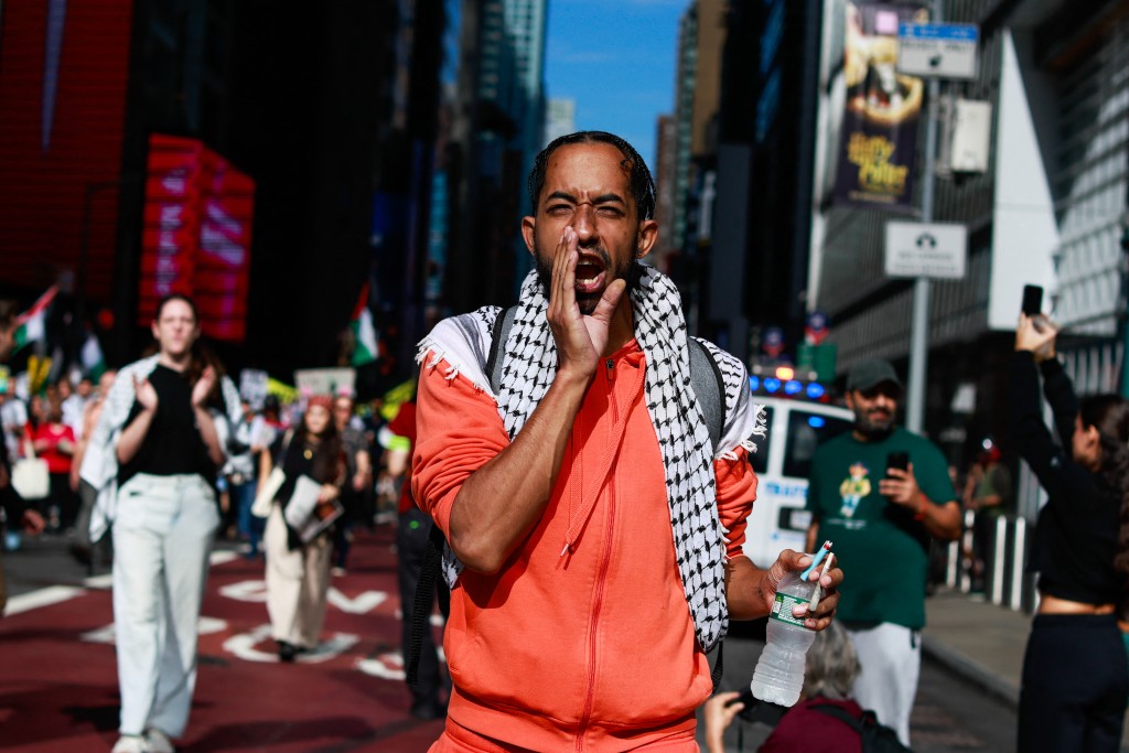 A protestor shouts as people take part in a march against Israeli Prime Minister Benjamin Netanyahu as he addresses the United Nations General Assembly in New York on September 26, 2025. (Photo by kena betancur / AFP)