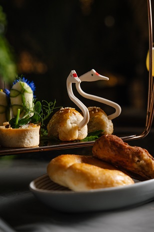 A gourmet iteration of the swan puff with barbecue pork.