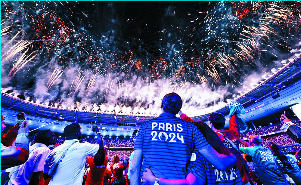 Fireworks light up the sky as the Paris Games end. REUTERS