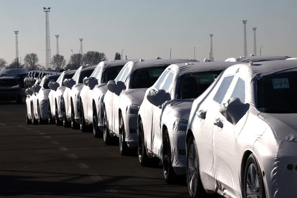 New cars are seen parked in the port of Zeebrugge, Belgium, October 24, 2024. REUTERS