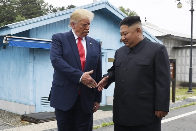 President Donald Trump meets with North Korean leader Kim Jong Un at the border village of Panmunjom in the Demilitarized Zone on Aug. 11, 2019. | Susan Walsh/AP