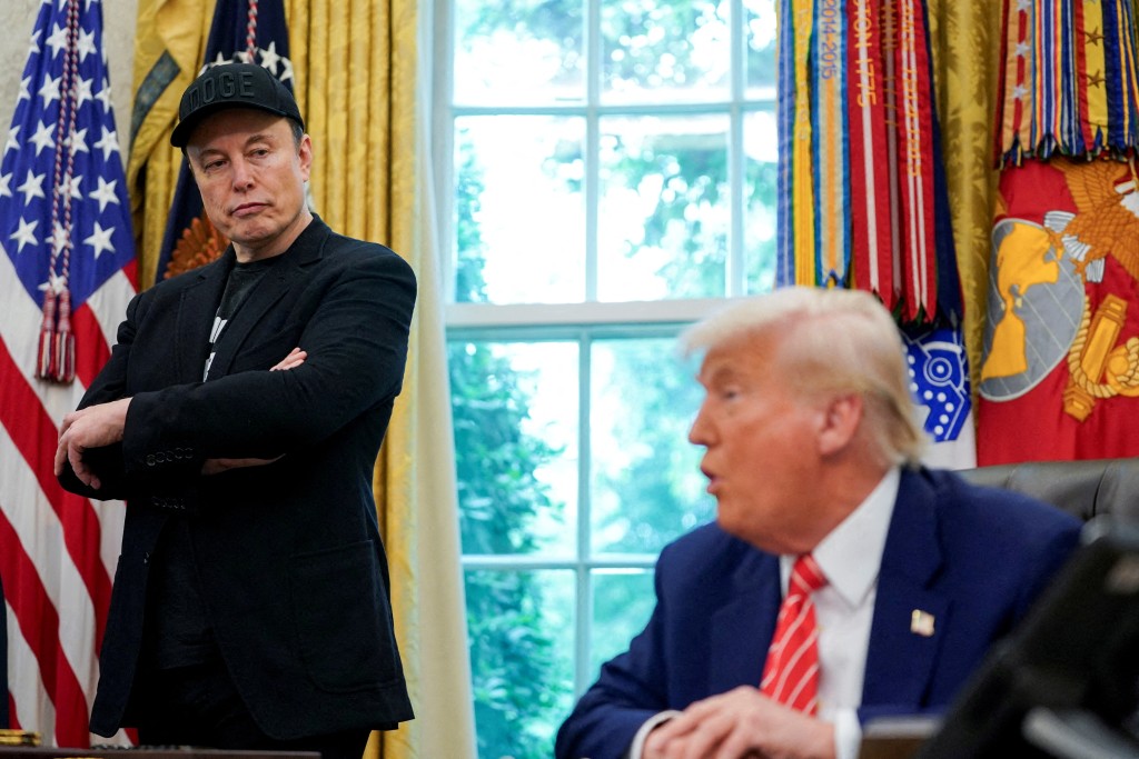 U.S. President Donald Trump and Elon Musk attend a press conference in the Oval Office of the White House in Washington, D.C., U.S., May 30, 2025. REUTERS
