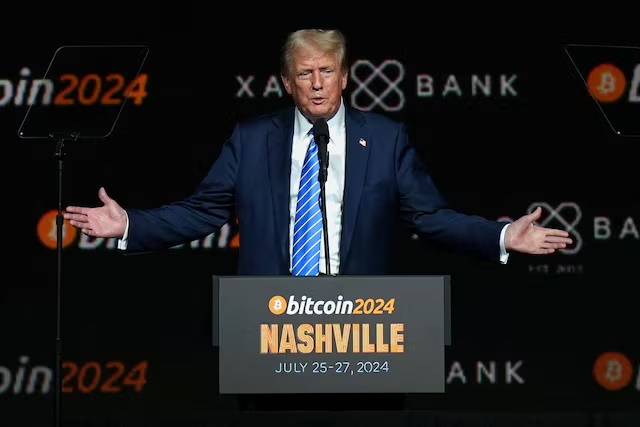 Republican presidential nominee and former U.S. President Donald Trump gestures at the Bitcoin 2024 event in Nashville, Tennessee, U.S., July 27, 2024. REUTERS/Kevin Wurm/File Photo