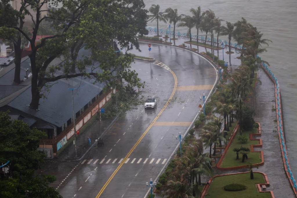  A car moves on a road as Tropical Storm Wipha approaches, in Quang Ninh province, Vietnam, July 22, 2025. REUTERS/Thinh Nguyen