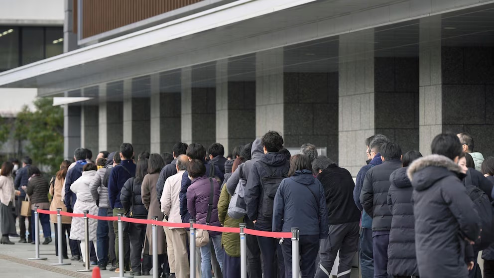 People queue up to get a ticket for a seat to observe a court's ruling on an attempted murder trial for Ryuji Kimura, who threw a homemade pipe bomb at former Japanese Prime Minister Fumio Kishida at a 2023 campaign event, outside Wakayama District Court in Wakayama, western Japan Wednesday, Feb. 19, 2025. (Shohei Miyano/Kyodo News via AP) People queue up to get a ticket for a seat to observe a court's ruling on an attempted murder trial for Ryuji Kimura, who threw a homemade pipe bomb at former Japanese Prime Minister Fumio Kishida at a 2023 campaign event, outside Wakayama District Court in Wakayama, western Japan Wednesday, Feb. 19, 2025. (Shohei Miyano/Kyodo News via AP)