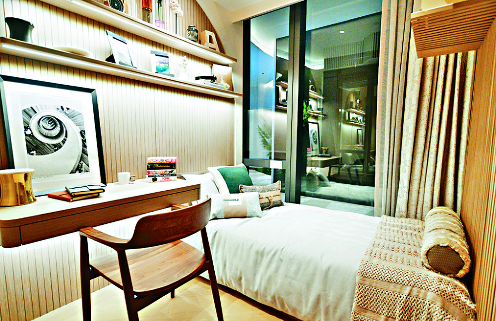 REST EASY: The bedroom follows the same color and design themes.