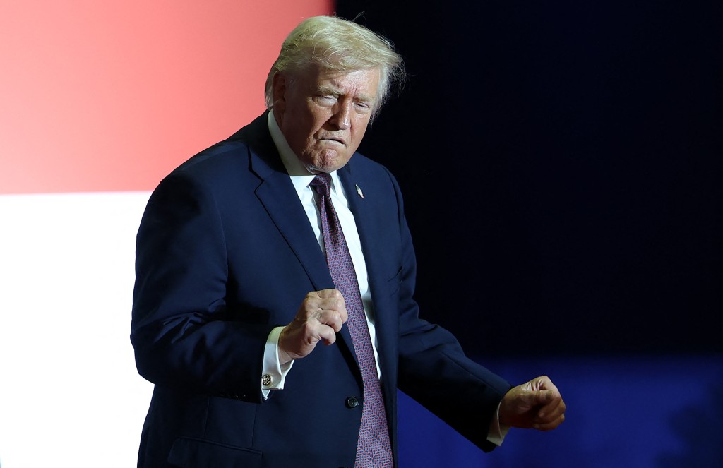 Photo by TASOS KATOPODIS / GETTY IMAGES NORTH AMERICA / GETTY IMAGES VIA AFP  U.S. President Donald Trump dances on stage during a rally at the Rocky Mount Event Center on December 19, 2025 in Rocky Mount, North Carolina.
