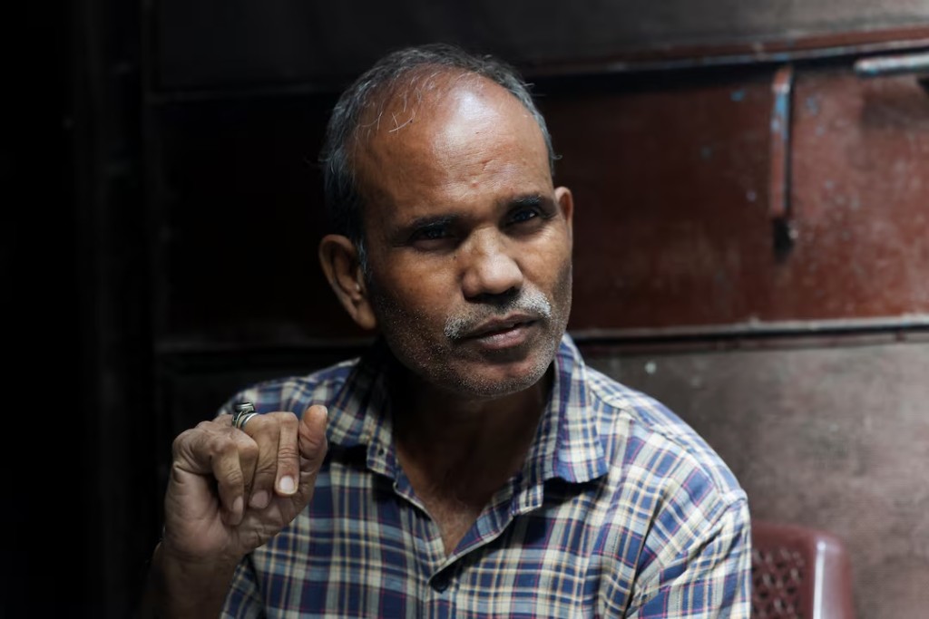  Kamta Prasad, 53, a voter who is listed as "Kanta Prasad" and is declared dead in the Special Intensive Revision (SIR) list published on August 1, 2026, gestures during Reuters interview in New Delhi, India, October 15, 2026. REUTERS/Priyanshu Singh