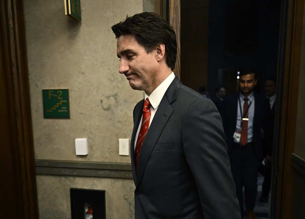 Justin Trudeau leaves the House of Commons after making his allegations. AP Justin Trudeau leaves the House of Commons after making his allegations. AP
