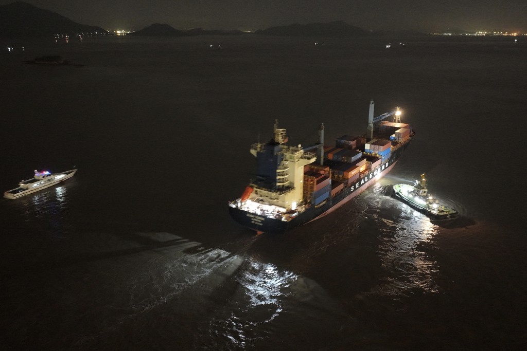 The Dubai Tower container ship, operated by Chinese shipowner Sea Legend, setting sail from the port of Ningbo headed to the port of Felixstow, England. (AFP)