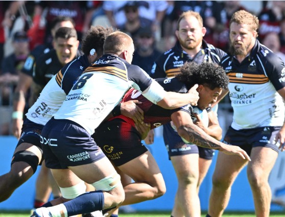 Leicester Fainga’anuku, center, in action for Crusaders. REUTERS