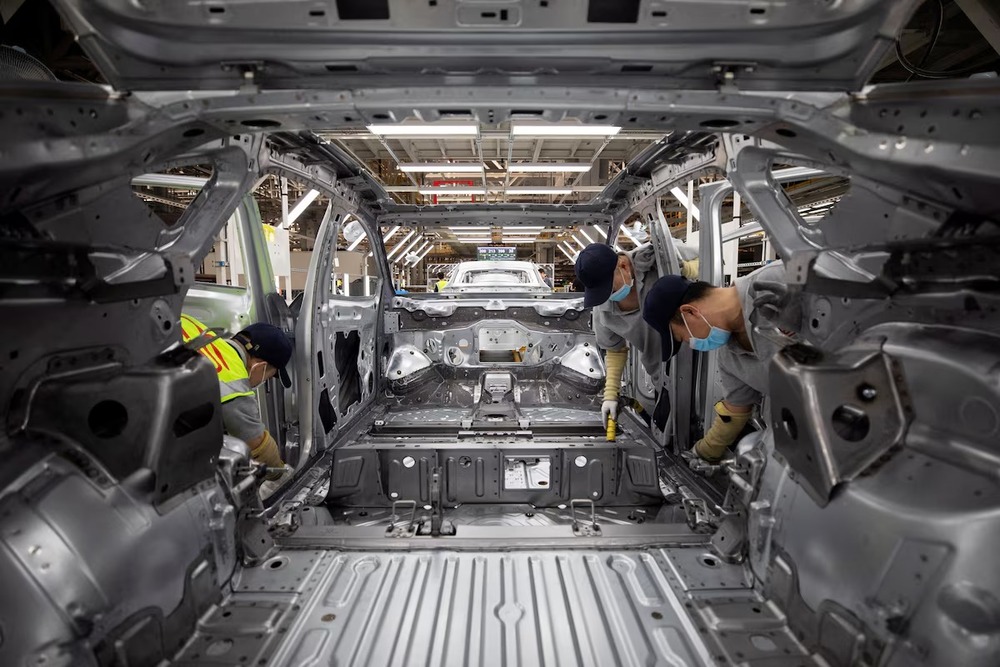 Employees work on an electric vehicle (EV) production line at a Volkswagen Anhui factory in Hefei, Anhui province, China September 25, 2024. China Daily via REUTERS Employees work on an electric vehicle (EV) production line at a Volkswagen Anhui factory in Hefei, Anhui province, China September 25, 2024. China Daily via REUTERS