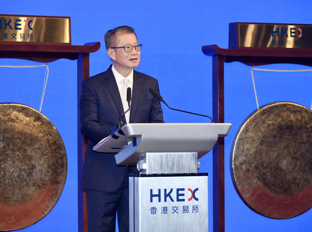 Paul Chan delivered a speech at the Hong Kong Stock Exchange on July 8 as six high-tech industrial firms debuted.