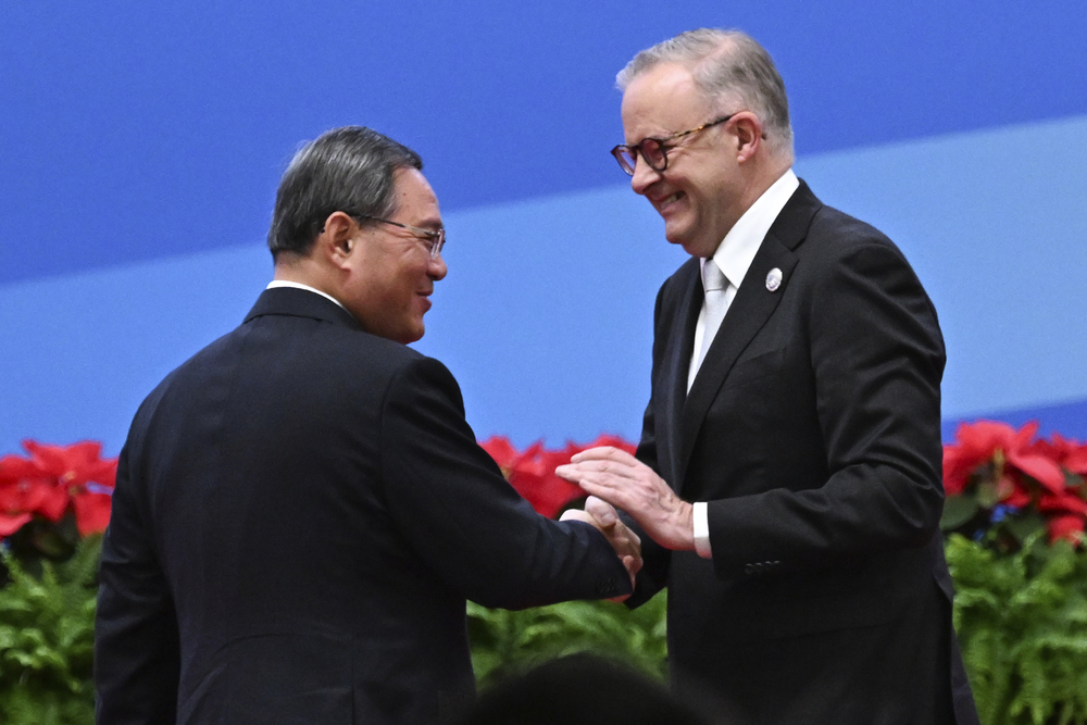 Li Qiang, shaking hands with Anthony Albanese, says China's pace of opening up will never stall.AP, AFP Li Qiang, shaking hands with Anthony Albanese, says China's pace of opening up will never stall.AP, AFP