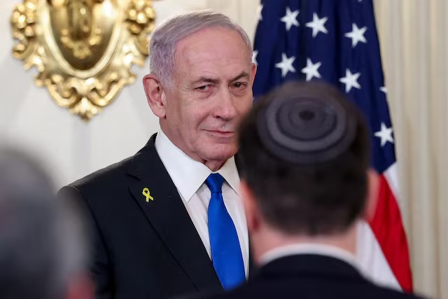 Israeli Prime Minister Benjamin Netanyahu arrives for a joint press conference with U.S. President Donald Trump (not pictured) in the State Dining Room at the White House in Washington, D.C., U.S., September 29, 2025. REUTERS/Jonathan Ernst 