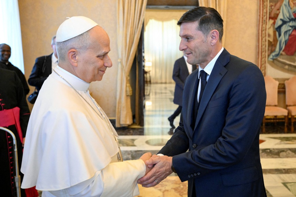 Pope Leo XIV shakes hands with Inter Milan Vice President Javier Zanetti. (Reuters)