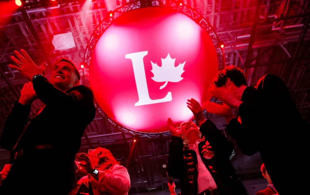 Supporters of Canada's Prime Minister Mark Carney react to polling numbers at the Liberal Party election night headquarters in Ottawa, Ontario, Canada April 28, 2025. REUTERS/Blair Gable
