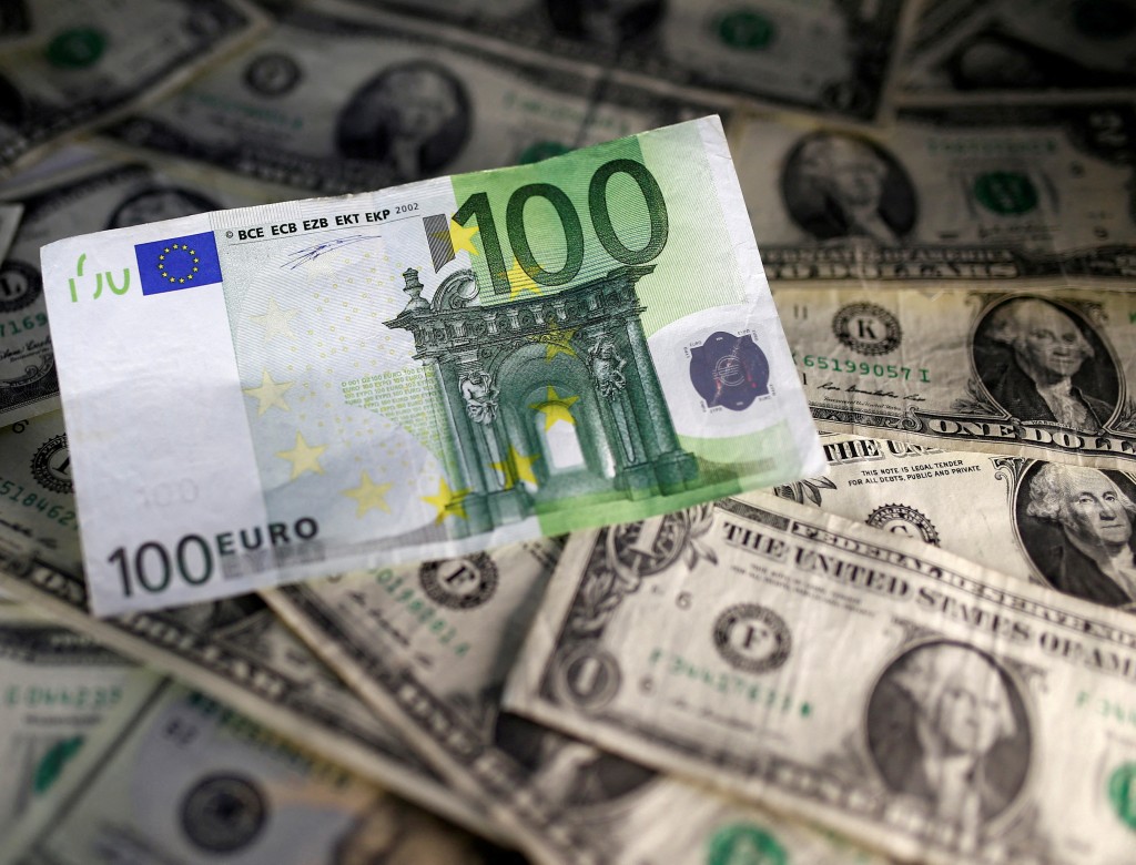 U.S. dollar and Euro notes are seen in this November 7, 2016 picture illustration. REUTERS