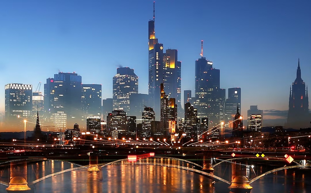The skyline of Frankfurt's financial district, February 11, 2021. Picture taken on long-time exposure while zoomed. REUTERS/Kai Pfaffenbach/File Photo The skyline of Frankfurt's financial district, February 11, 2021. Picture taken on long-time exposure while zoomed. REUTERS/Kai Pfaffenbach/File Photo