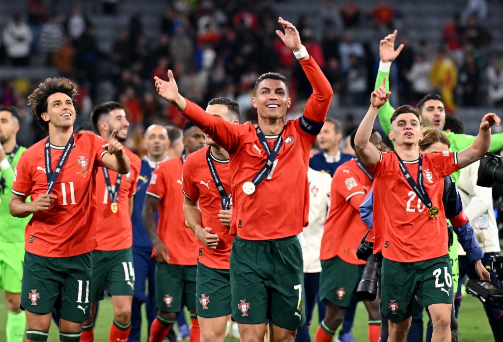 Portugal's Cristiano Ronaldo, Francisco Conceicao and Joao Felix celebrate in front of the fans after winning the UEFA Nations League. (Reuters)