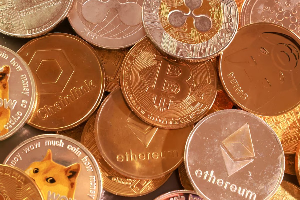 Representation of cryptocurrencies are seen in this illustration taken September 10, 2025. REUTERS