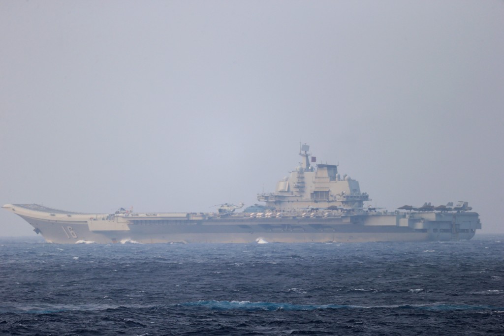 Chinese aircraft carrier Liaoning sails through the Miyako Strait near Okinawa on its way to the Pacific in this handout photo taken by Japan Self-Defense Forces and released by the Joint Staff Office of the Defense Ministry of Japan on April 4, 2021. (Reuters)