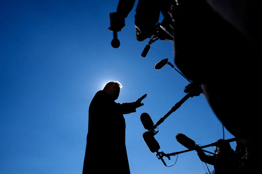 U.S. President Donald Trump speaks with the press before departing from the South Lawn at the White House in Washington, D.C., U.S., February 13, 2026. REUTERS/Kent Nishimura