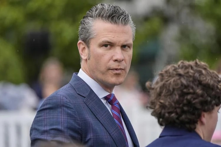 Defense Secretary Pete Hegseth arrives on the South Lawn of the White House before President Donald Trump and first lady Melania Trump participate in the White House Easter Egg Roll Monday, April 21, 2025, in Washington. (AP Photo/Alex Brandon)