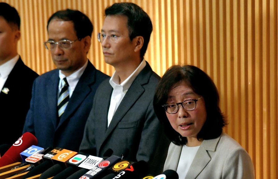 Secretary for Development Bernadette Linn Hon-ho addressing the press on the latest citywide scaffolding-net testing regime on Thursday (Dec 11).